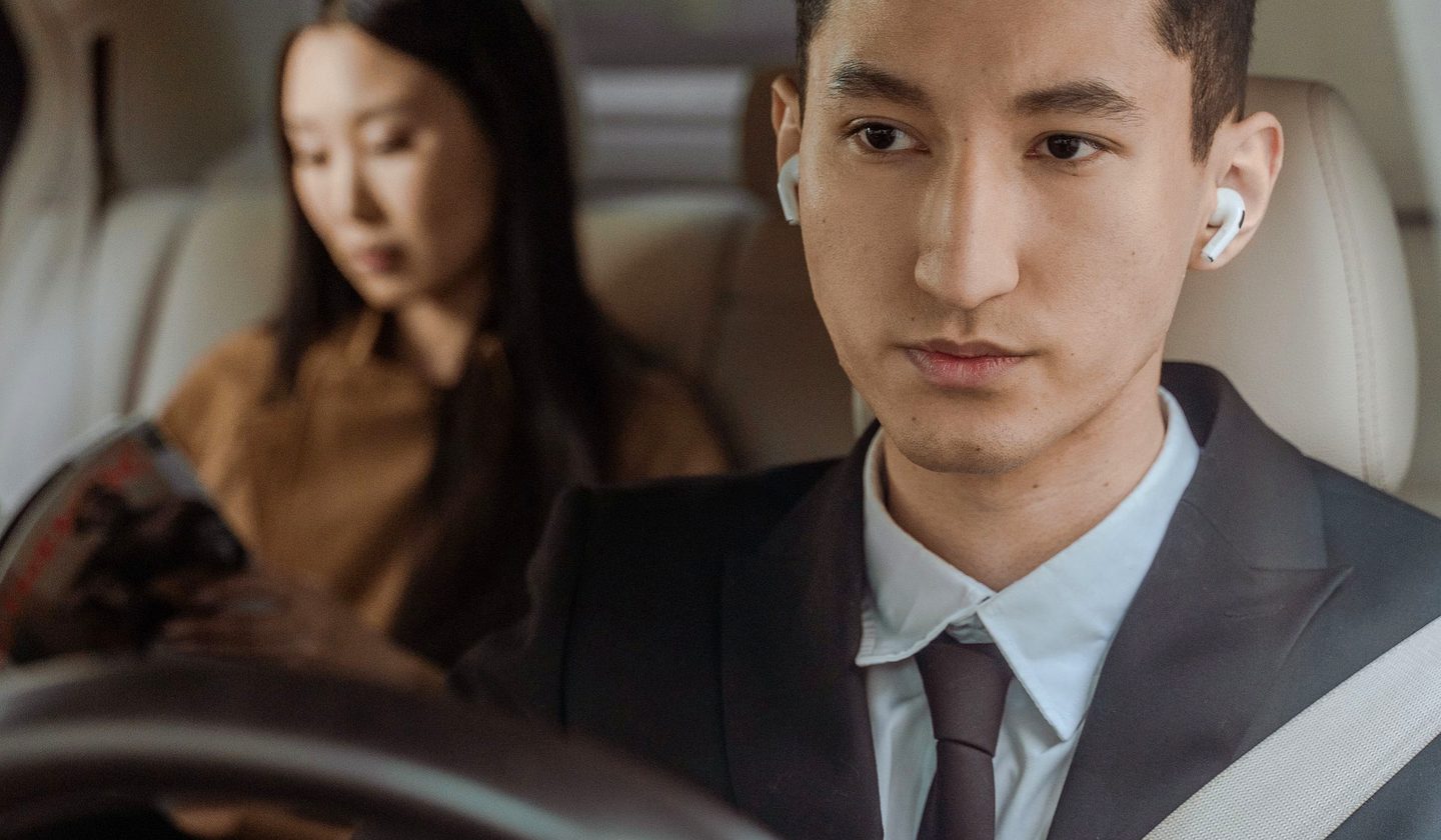 A professional driver in a suit